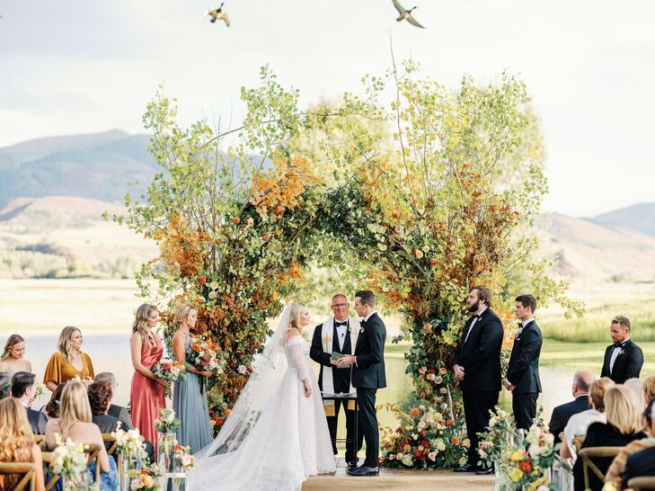 Wedding Ceremony With Rustic Arch at Chaparral Ranch in Aspen, Colorado