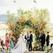 Wedding Ceremony With Rustic Arch at Chaparral Ranch in Aspen, Colorado