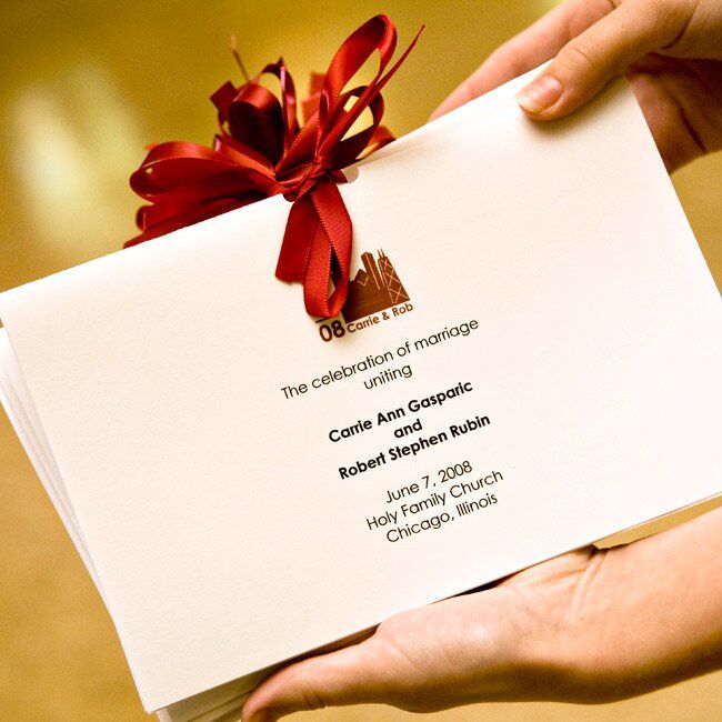 Simple programs emblazoned with the city skyline and tied with satin ribbon detailed the interfaith ceremony.