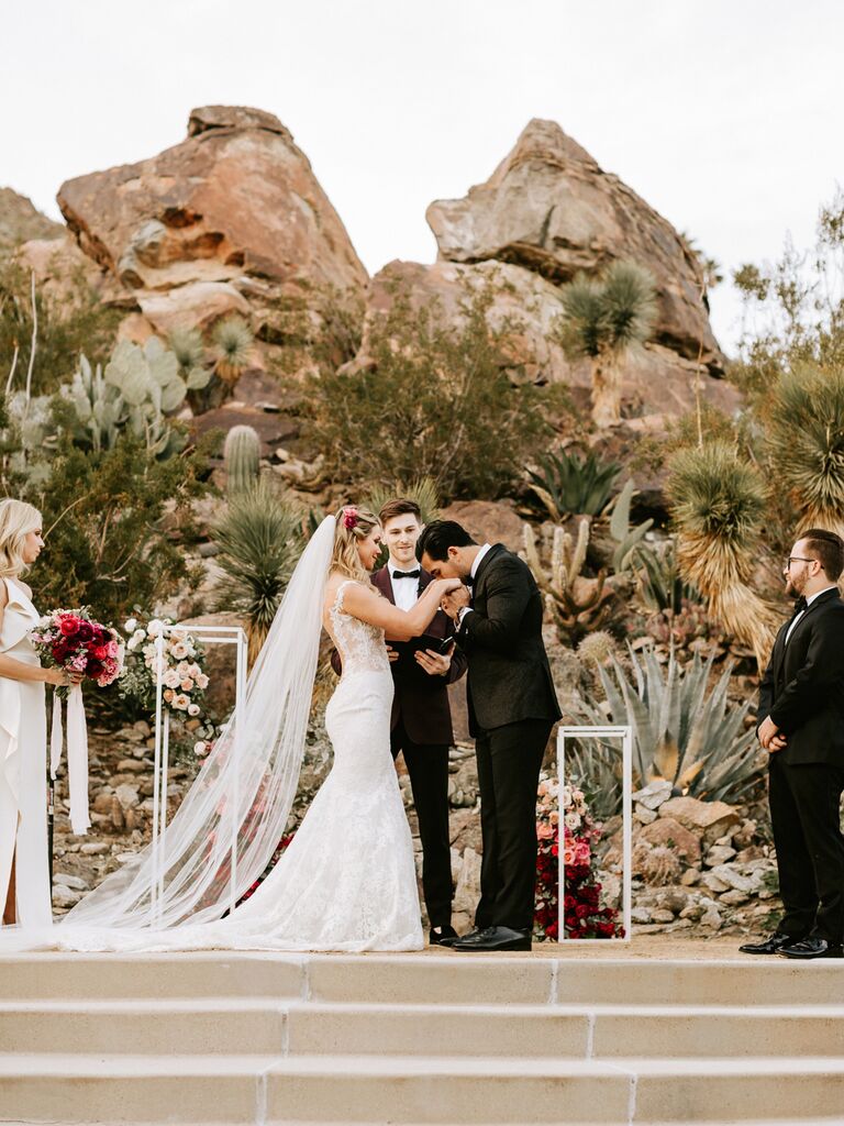 disney themed wedding kiss on hand