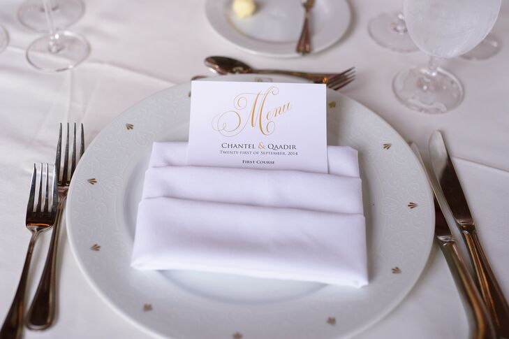 The couple decorated their reception with white chargers, gold chiavari chairs, ivory linens and tall floral centerpieces in shades of white and pink.