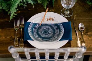 Vintage-Modern Place Setting with Blue Napkin and Gold Flatware