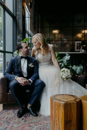 Bride in Lace-and-Tulle Gown and Structured Bouquet With Groom in Navy Tuxedo, Warehouse Venue