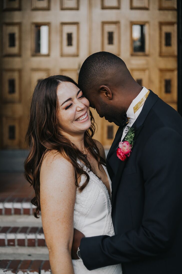 Couple Laughing During Wedding Portraits at Ebell Long Beach in California