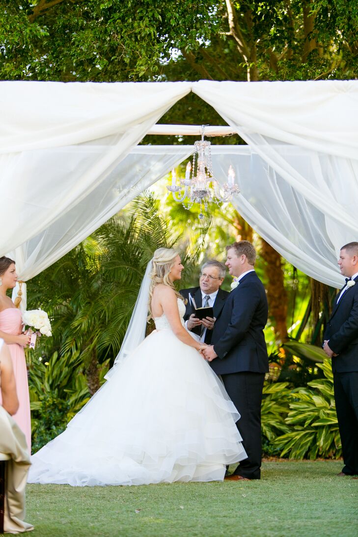 Once she decided on the dress, the pros at Bella Bianca Bridal Couture were ready to show her the matching veil. It was designed with white tulle and had the same bold, white trim as her skirt. The accent also fit perfectly into her down, curled hairstyle.