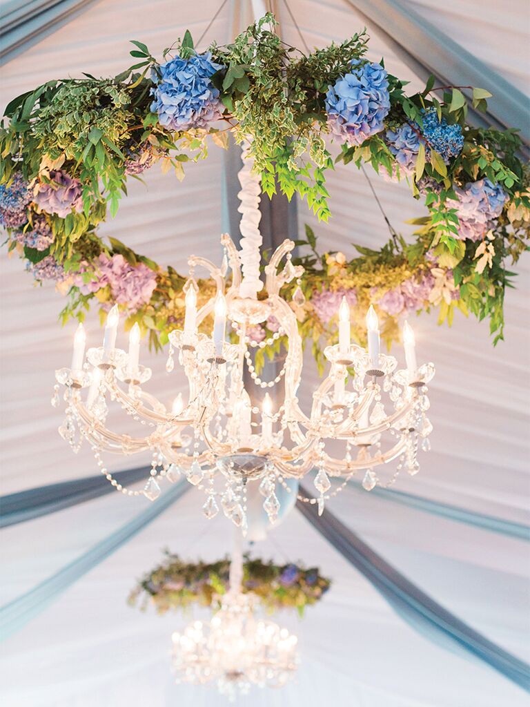 Floral chandelier at fairytale-themed wedding