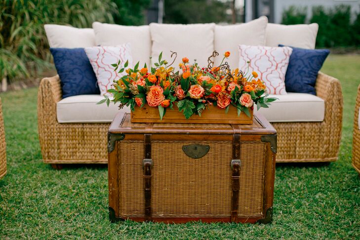 During cocktail hour, guests sipped cocktails and ate tasty appetizers while relaxing on beachy seagrass lounge furniture.