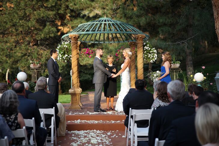 Courtney and John exchanged vows under a pavilion on the grounds of La Caille in Sandy, Utah. "I wanted a beautiful outdoor, garden ceremony, and La Caille is simply picturesque," Courtney says. "It can’t be beat."