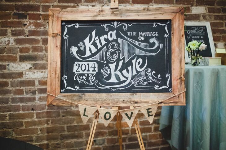 Kira and Kyle incorporated ornate chalkboards throughout the day. The rustic welcome sign was framed in wood and decorated with burlap love flags.
