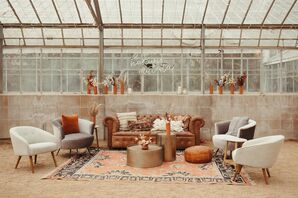 Lounge Area with Leather Couch and Copper-Hued Accents