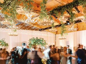 Guests at WEdding Reception With Rustic Antler Chandeliers