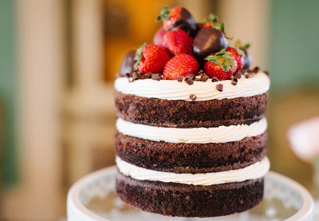 Chocolate naked cake with strawberries on top