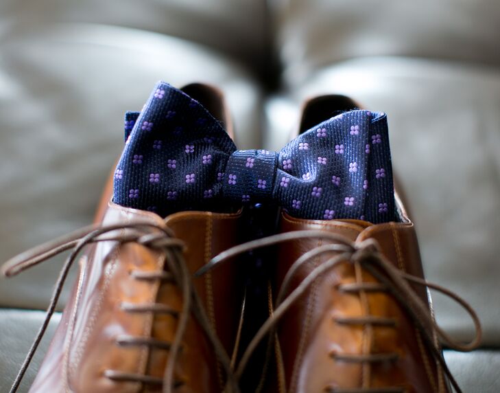 Matt accessorized his Ted Baker wedding suit with a navy bow tie from Ted Baker and brown leather shoes from Doucal's.