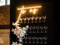 champagne escort display wall coupe glasses neon sign wedding reception anniversary party
