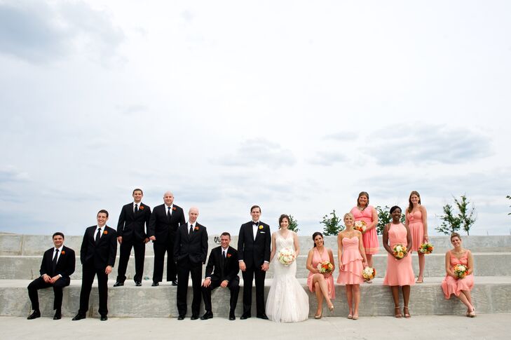 Brielle asked her bridesmaids to wear short, coral chiffon dresses in diverse styles from the Watters line. “I wanted the bridesmaids to embody summer,” says Brielle. “Coral is such a fun color, and there is something very effortless about chiffon.” The groomsmen looked timeless in black Vera Wang tuxedos.