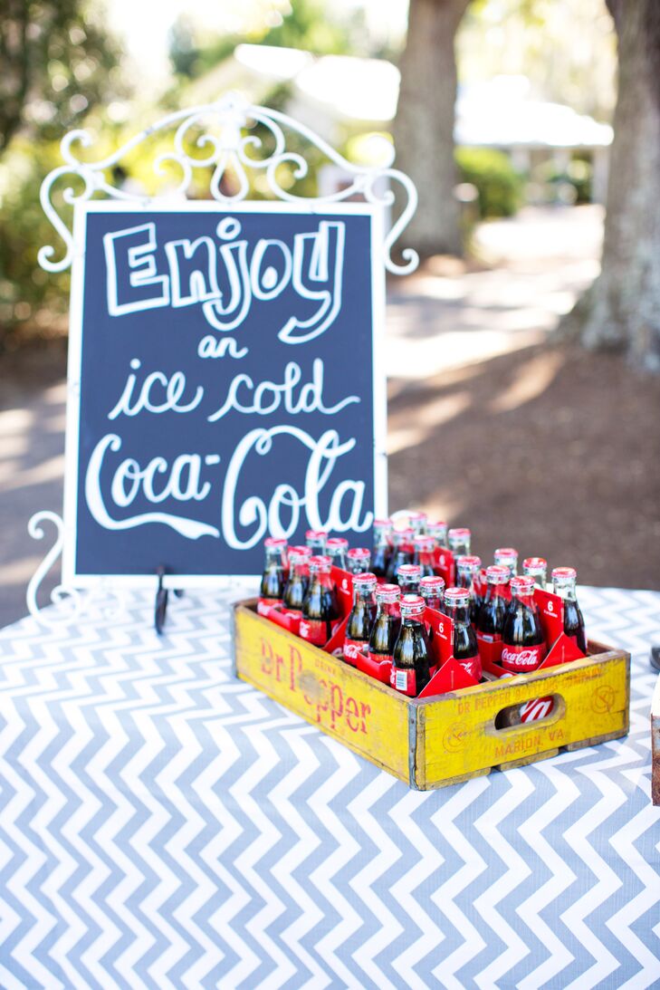 Amalie and Jason had a Coca-Cola stand as guest entered the ceremony venue, offering a glass bottled coke with a paper straw.