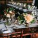 Centerpieces with Dinner Plate Dahlias, Roses and Magnolia Leaves