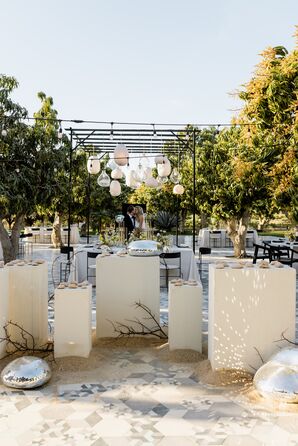 Garden Reception, White Platforms, Lantern Structure and Melted Disco Balls