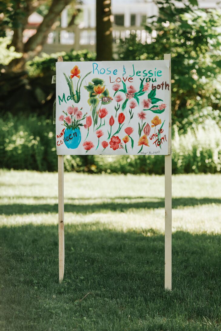 Hand-Painted Flower Sign for Backyard Minimony in Reading, Massachusetts