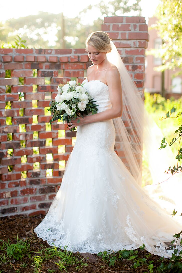 Christi knew she had to have a cathedral-length veil to complete her look, because she wanted the dramatic sophistication created by the veil for her wedding day outfit.