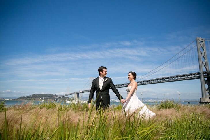 Chris guided Chelsea through the fields in San Francisco, California, with a backdrop of the Bay Bridge. He wore a custom-made black tuxedo for the wedding, made of the same fabric as Chelsea's dress. He wore an ivory tie that matched Chelsea's white Martina Liana gown.