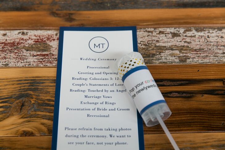 Every guest received a confetti popper to use after the ceremony at Ovation Chicago in Chicago, Illinois. The programs also asked guests to refrain from taking photos during the ceremony, using the line, "We want to see your face, not your phone."
