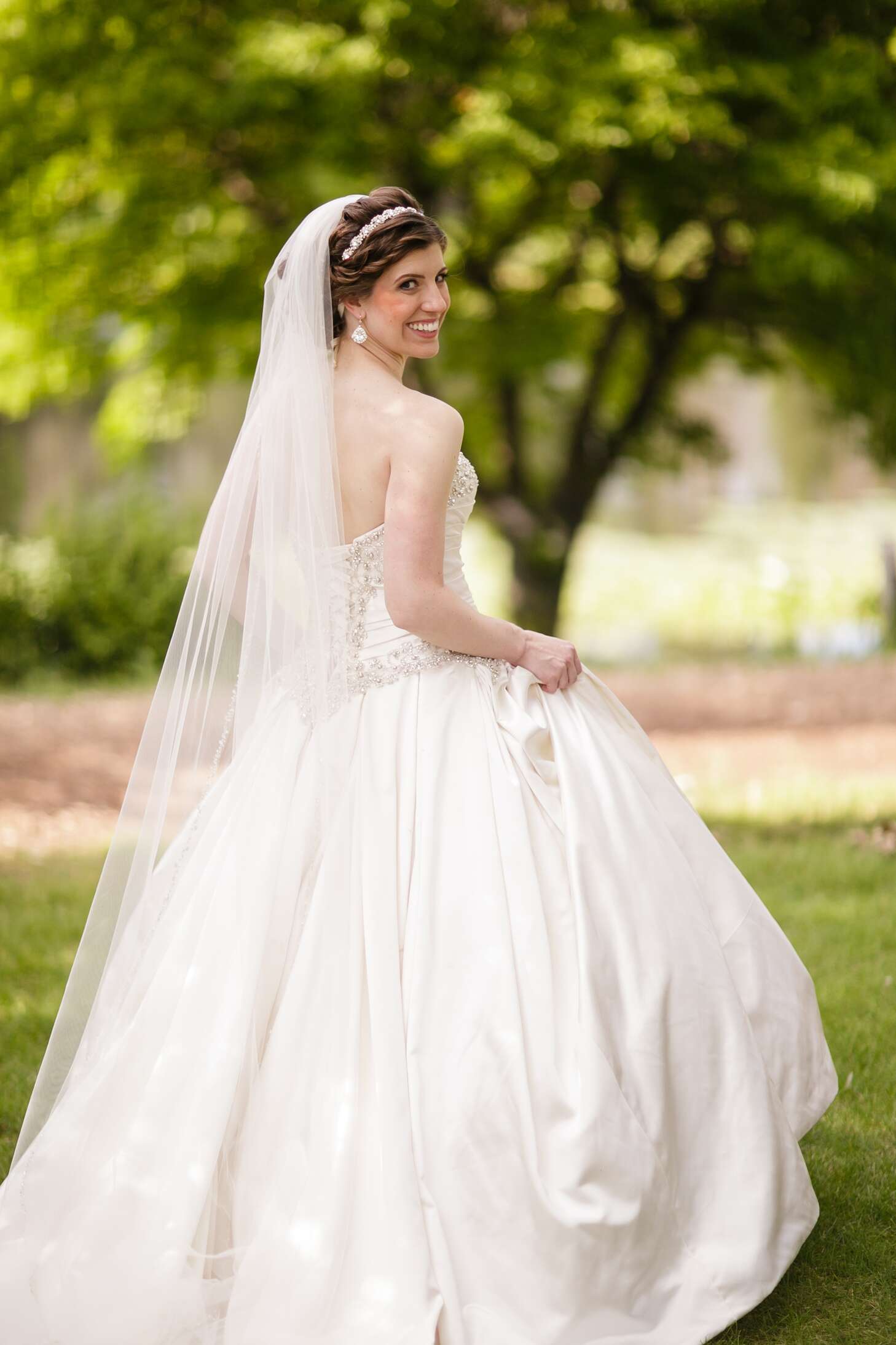 The Bride's Princess Ballgown and Cathedral-Length Veil