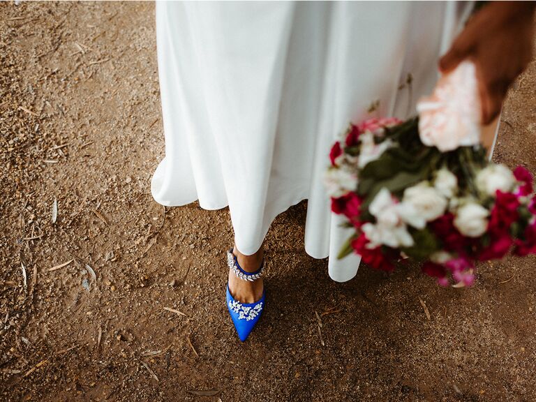 bride wearing blue shoes