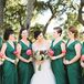 The bridesmaids wore deep green V-neck dresses, holding a single pink peony for a pop of color. "To capture the deep green of live oaks in the Texas Hill Country, the girls wore the same flowing dark green chiffon gowns we purchased from my hometown’s Bella Bridesmaid shop," Ann says. "The dresses went well with everyone’s skin tones and body types."