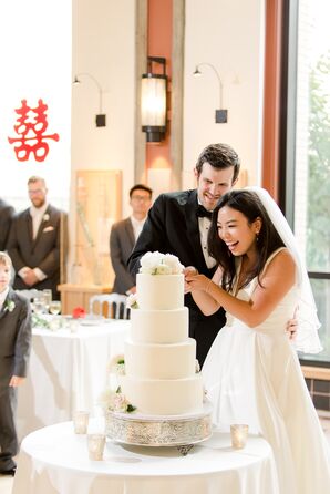 Traditional Cake Cutting with Tiered White Fondant Cake