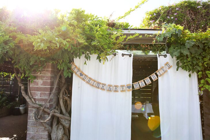 Burlap accents and potted succulents lent a rustic feel to the alfresco affair.