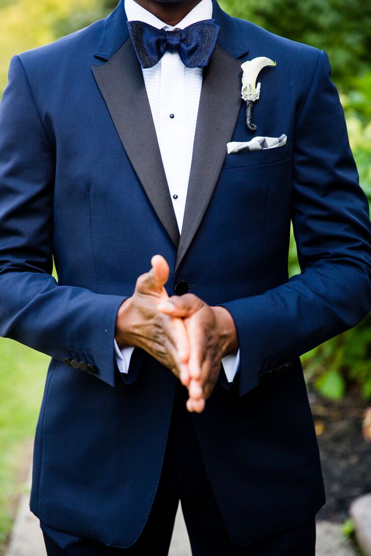 Barry wore a navy Burberry tuxedo with satin lapels paired with an Eton formal shirt with a plisse front. To top the look, he wore a Thomas Pink navy bow tie and a white pocket square.
