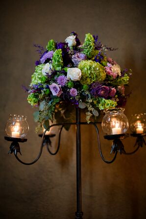 Lush Flower Arrangement on Black Candelabra