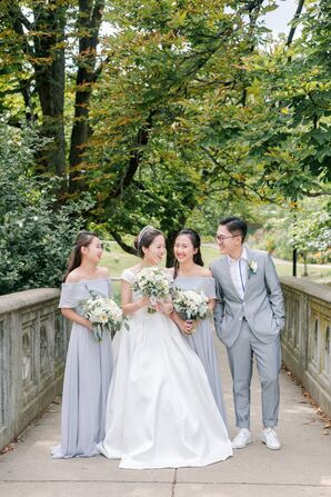 The Bride With Wedding Party in Gray Attire on Wedding Day