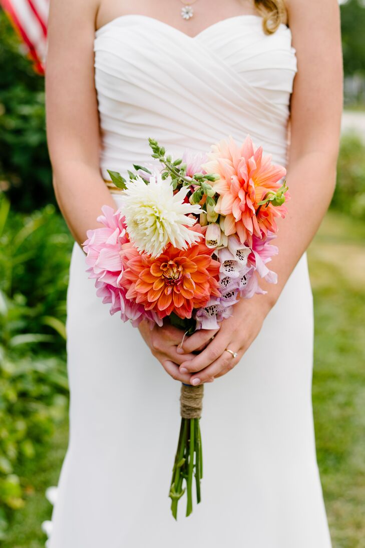 Meredith's bouquet was filled with bright pink and coral dahlias and pale purple fox glove, which were gathered from her neighbor's and mother's gardens.