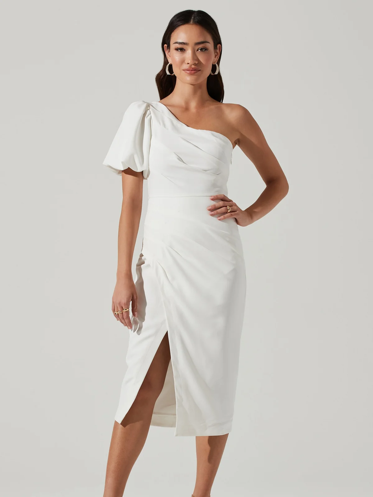 A model shows off this gorgeous white one-shoulder gown with a wrap waist.