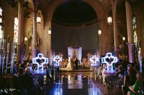 Ceremony in a Church Setting With Neon Heart Crucifixes, Low Lighting