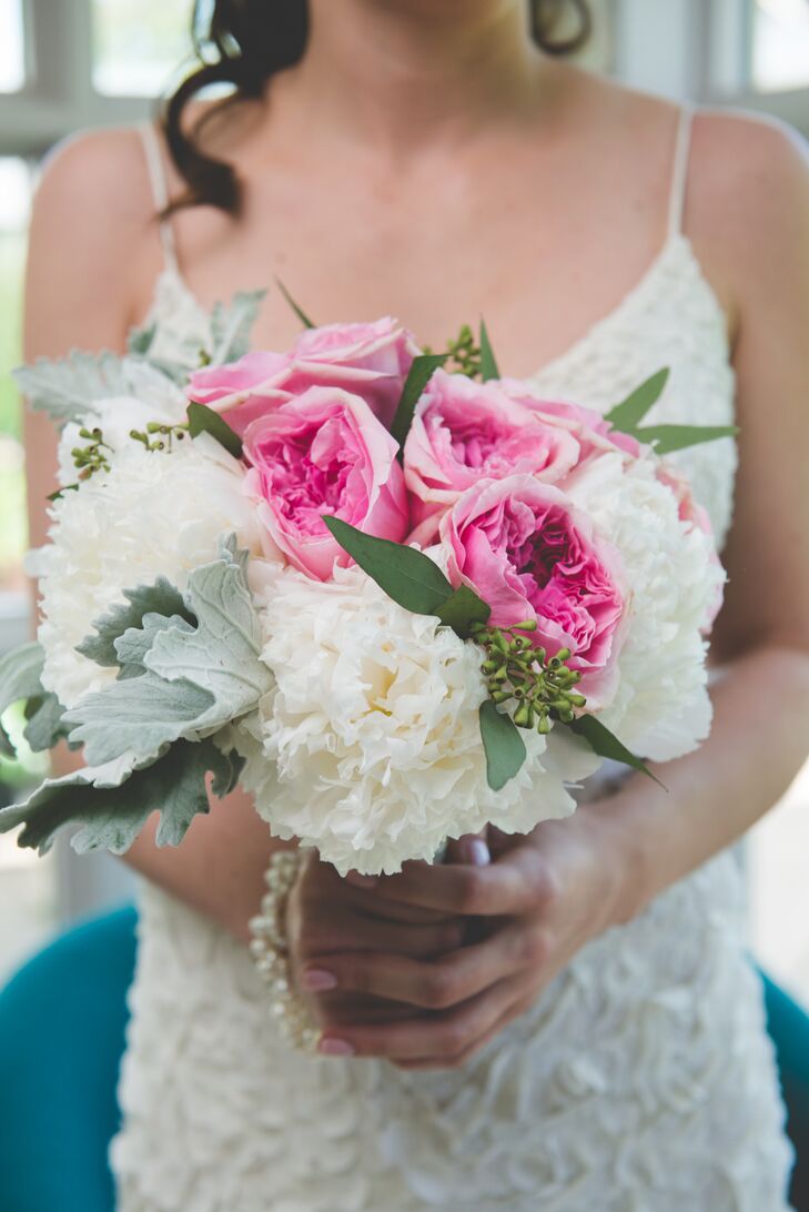 Nicole carried a bouquet with bright pink roses and white peonies.