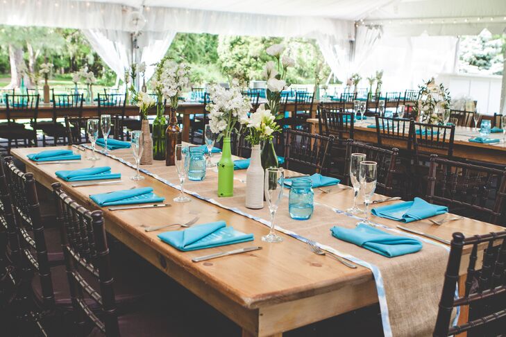 Farmhouse Tables with Blue Linens and Burlap Runners at Tented Reception