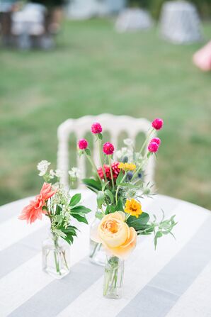 Bright Blooms Arranged Atop Striped Linens