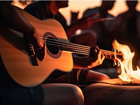 Picture of guitar at indoor fireplace