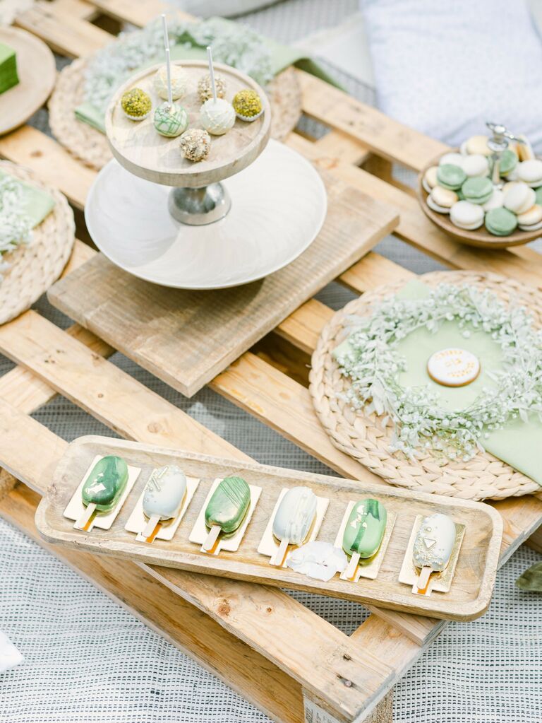 Pale green dessert table for a bridal shower. 