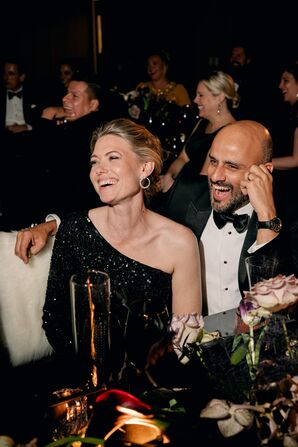 Wedding Guests Laughing During Wedding Reception