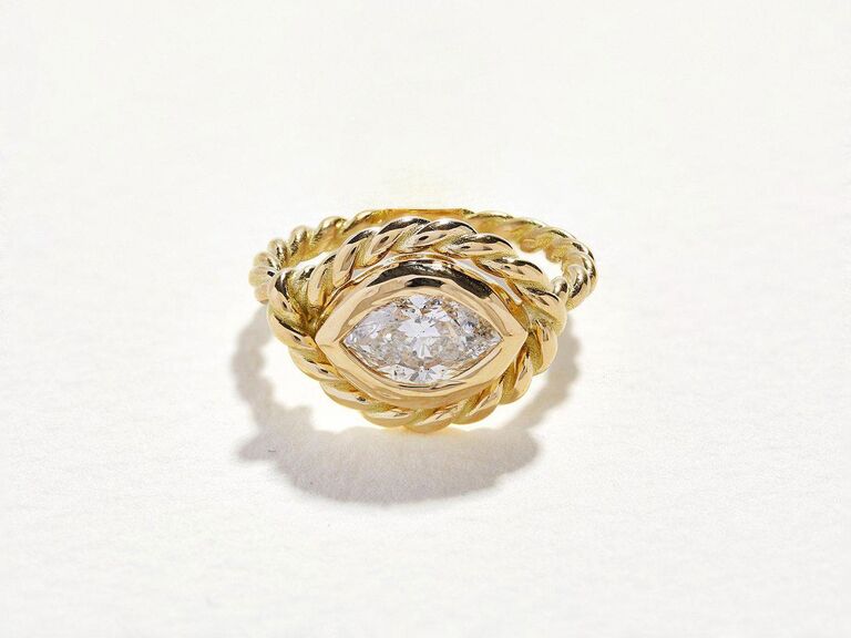 marquise cut diamond ring in yellow gold rope setting