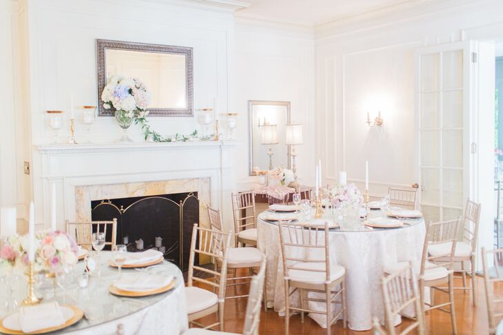 Gold chiavari chairs were used to play up the simplicity of the all-white room, where guests dined on watermelon and grapefruit mocktails during dinner.