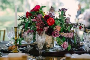 Deep Red and Purple Flower Centerpiece in Gold Vase