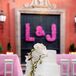 Even with all the vibrant colors in their wedding, Louisa and Joseph had a classic wedding cake. It had three round tiers with a cascade of white orchids down one side for a pretty touch.