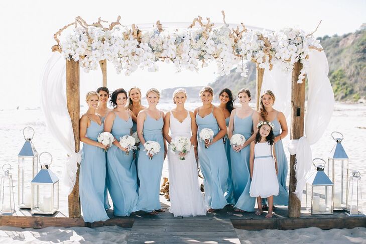 "I had nine bridesmaids, and they wore the same Joanna August dress," Leah says. "The light blue color looked good with all skin tones and hair colors. The long length, straps and belt around the natural waist were figure flattering for all body types."