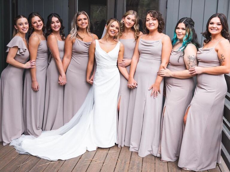 Sydney Sweeney and other bridesmaids smile for the camera. 