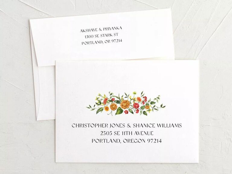 Colorful floral personalized wedding invitation envelope from The Knot Invitations